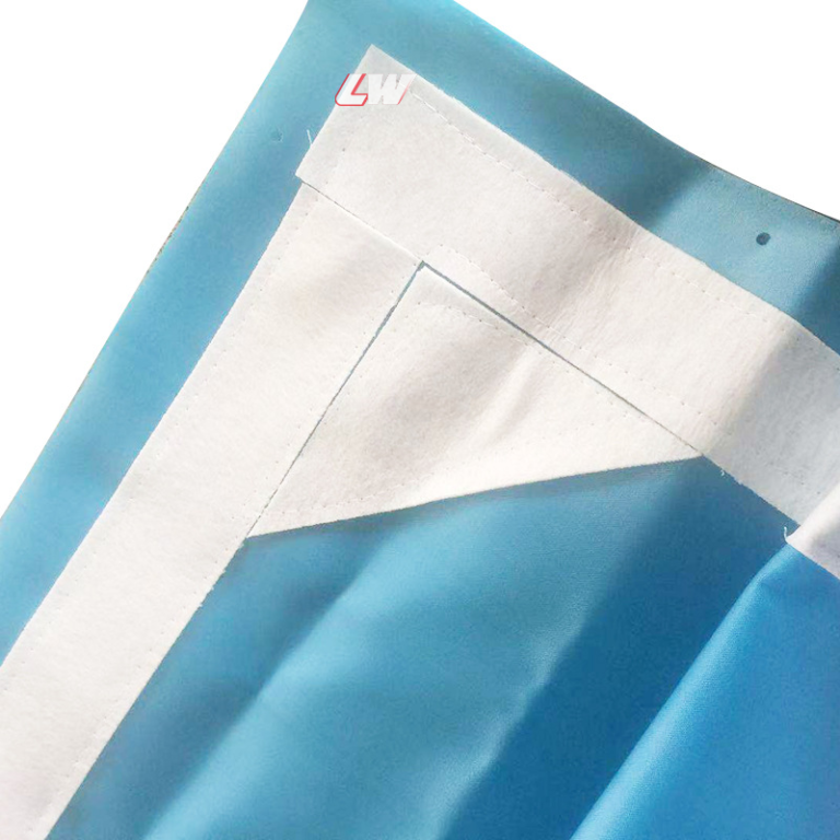 Close-up of a Loway filter press cloth with corner seam, mounted on a blue plate