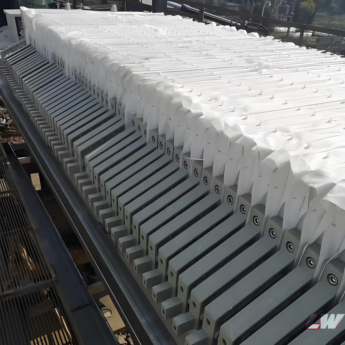 Membrane filter press with squeeze plates installed in production line