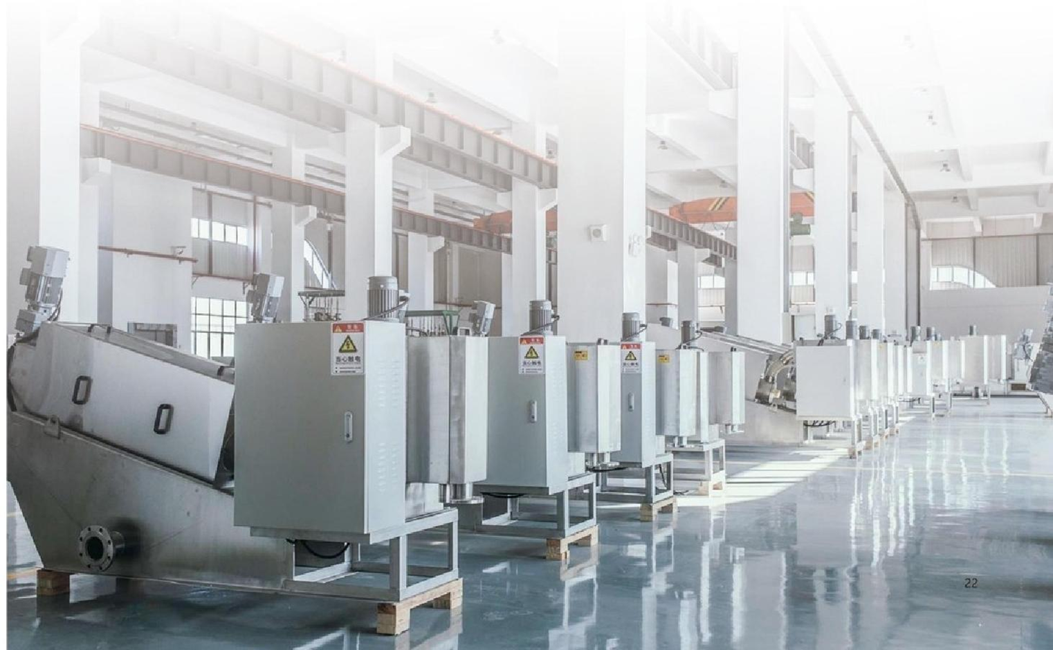 Loway screw press units on the factory floor before shipment