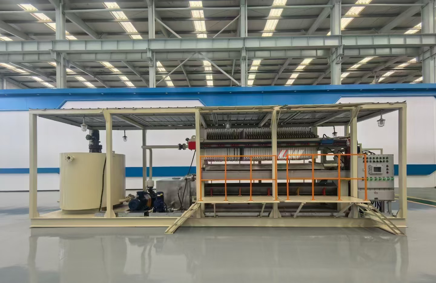 Skid-mounted filter press installation, showing space-efficient layout