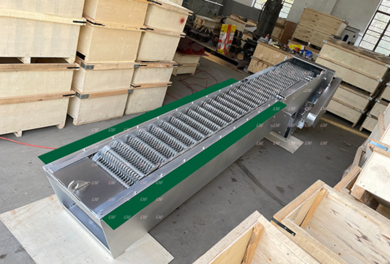 Rotary bar screen in the Loway factory beside export crates