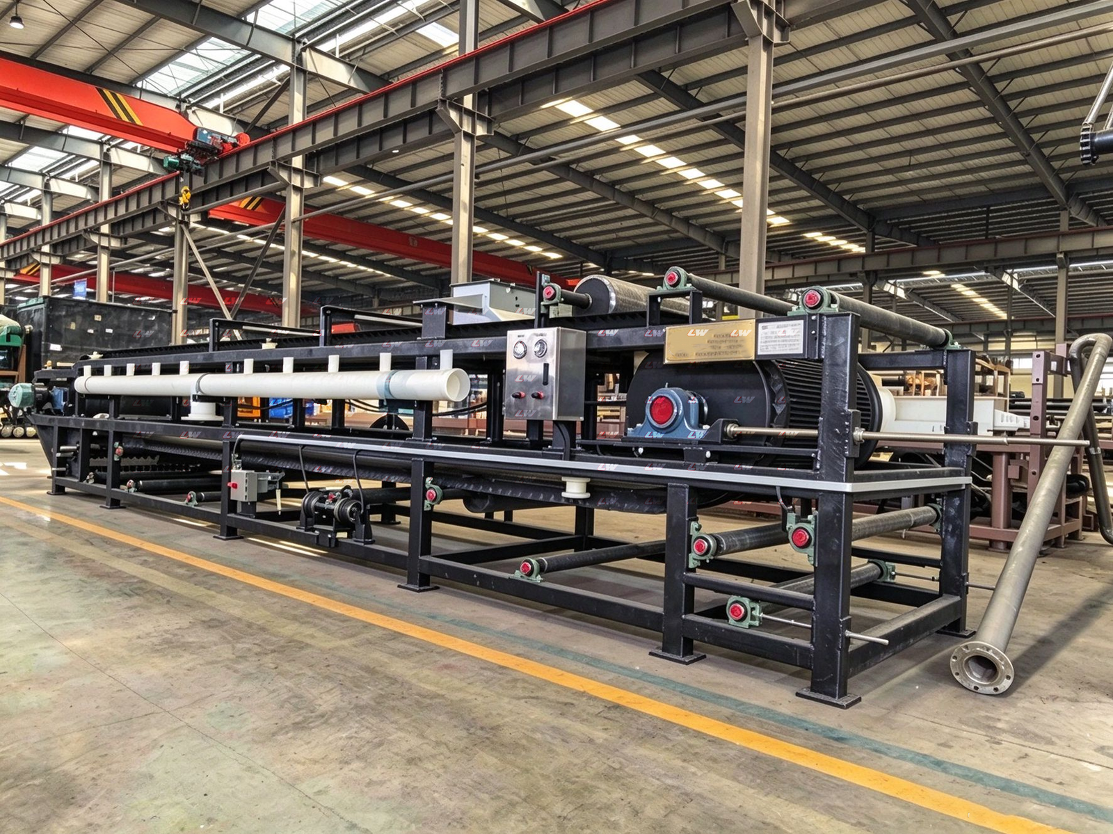 Loway vacuum belt filter press during final assembly, drive and control panel fitted