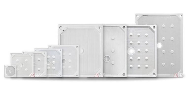 A range of Loway polypropylene filter plates in different sizes, showing the sealing surfaces and feed ports